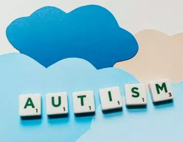 word Autism spelt out with puzzle pieces